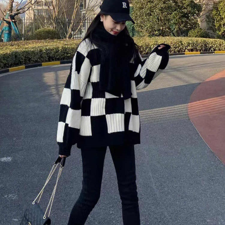 High-end two-piece set with plaid sweater and black shark pants for women. Comfortable and stylish casual outfit.